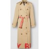 BURBERRY - Trench coat in gabardine di cotone con stampa con logo - Honey